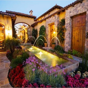 Nightime water feature and landscaping